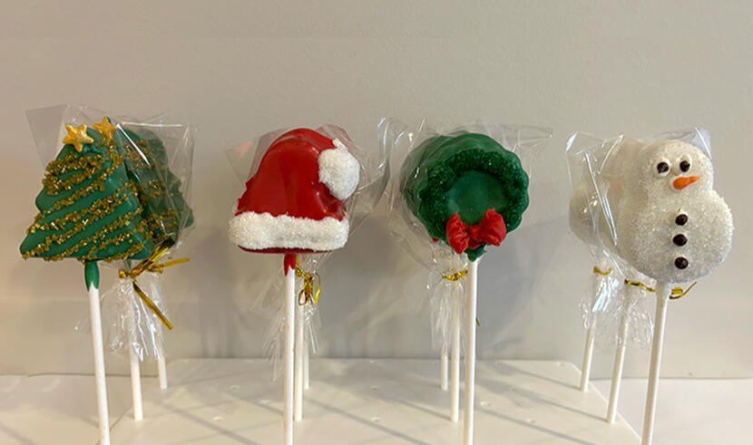Cutie Pops Cake Pops available Holiday Shapes this year include Christmas Trees, Santa Hats, Christmas Wreaths, and Cute Little Snowmen